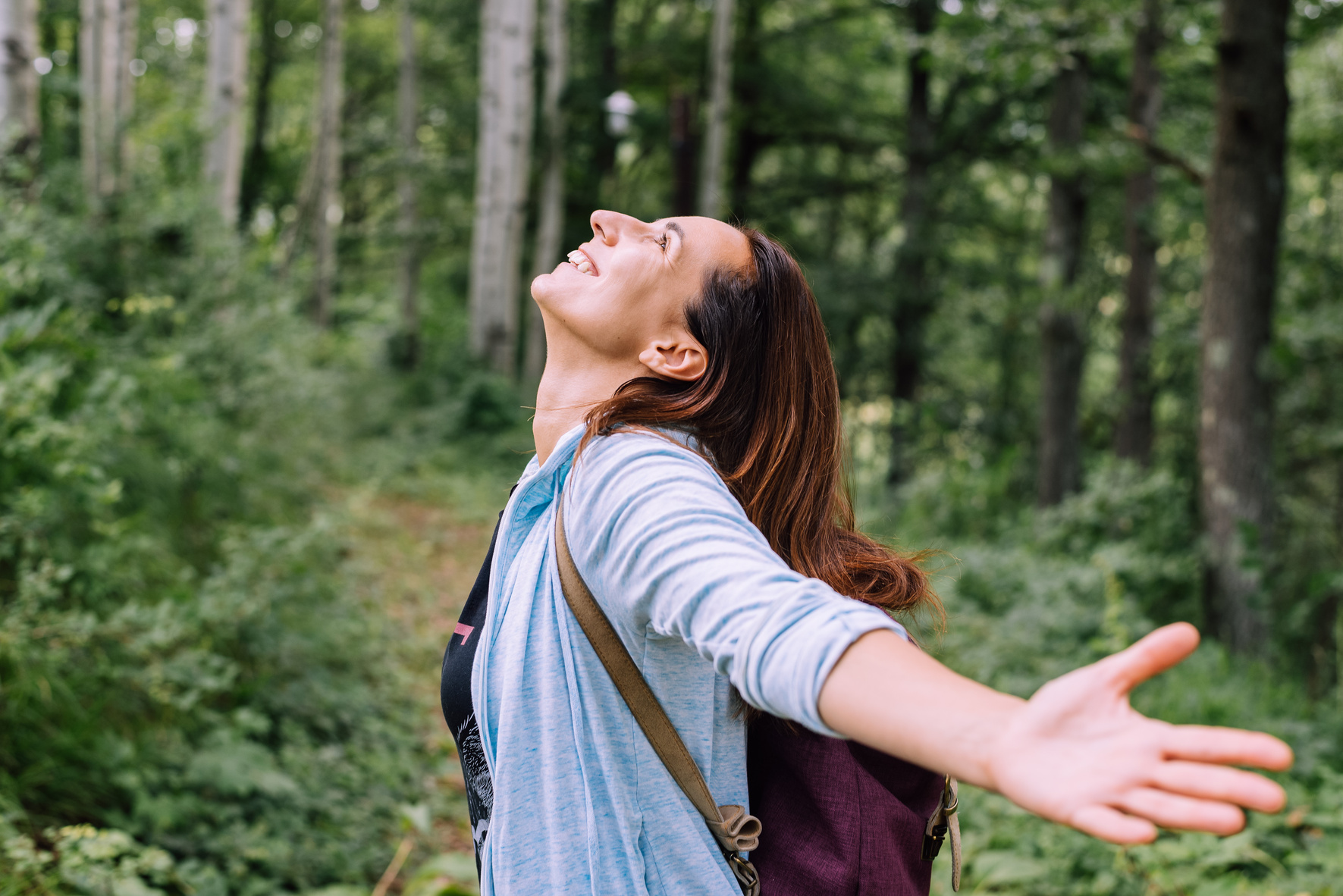Woman forest bathing